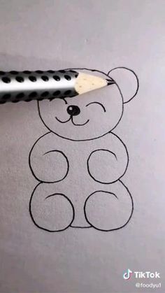 a drawing of a teddy bear with a pencil in it's mouth