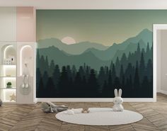 a room with a large wall mural in the shape of mountains and trees on it