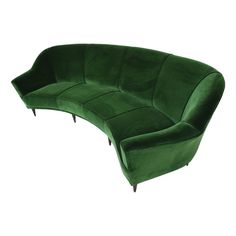 a green curved couch with black legs on a white background in the style of art deco