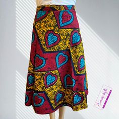 Ankara/ African print wrapper skirt fits one size length/ height from waist 24.5 inches. About this item, These one size wrapped skirts are designed to fit from S to 2XL size Ideal to wear it casually or during festivals.  Also it can be great to chill with friends or even on holidays It is made from African print fabrics. Lightweight fabric so should be comfortable at all times Handmade in UK. Product details, Material composition100% Cotton Care instructionsMachine washable up to 40 degrees, g Ankara Wrap Skirt, Wrapper Skirt, Skirt African Print, Mid Skirt, African Print Fabric, Skirt Fits, Womens Skirts, Wrap Skirt, African Print