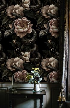 a wallpaper with flowers and snakes on it