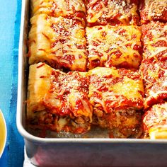 a casserole dish filled with meat and cheese