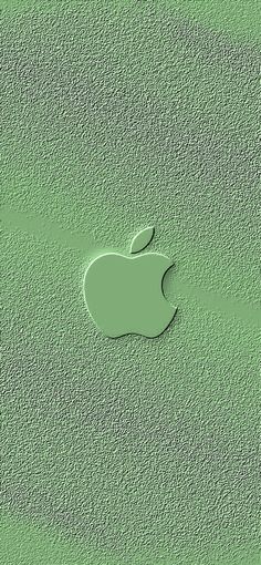 an apple logo is shown on the sand