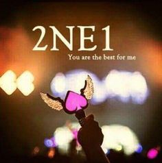 someone holding up a heart shaped object with the words, 2ne1 you are the best for me