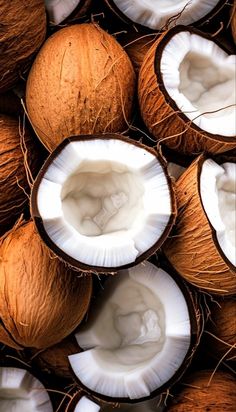 coconuts are shown with the tops cut open