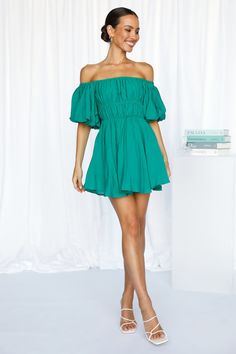 Length from shoulder to hem of size S: 72cm. Green mini dress. Lined. Cold hand wash only. Model is a standard XS and is wearing size XS. True to size. Lightweight, non-stretchy fabric. Shirred, elasticised neckline and torso. No zipper. Slip-on style. Ruched placement may vary. Tulle petticoat. Polyester. You're looking extra cute and feminine wearing our Be Your Baby Doll Dress! Featuring this season's lush and super sweet baby doll silhouette, we are living for this mini dress's ruched style, Doll Silhouette, Tulle Petticoat, White Stilettos, Prom Shopping, Baby Doll Dress, Green Mini Dress, Flared Skirt, Super Sweet, Babydoll Dress