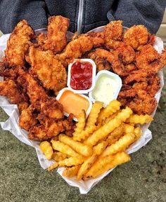 fried chicken and french fries with ketchup on the side