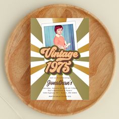 a wooden plate with an old photo on it and the words vintage 1970 written in orange