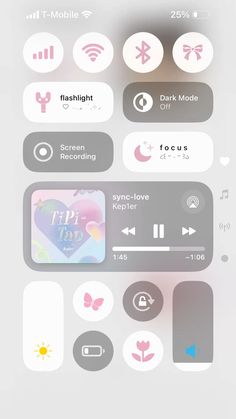 an iphone screen with various icons and buttons on the bottom right hand corner, including music player