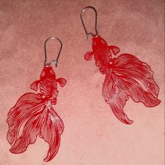 Pretty Flowy Goldfish Earrings Fins Almost Seem Like A Flower To Me. Maybe A Beta Fish. So Lightweight I Call Them Feather Weight, Very Delicate , Intricate Hollow Cut Out Design. Shiny Red Color I Also Sell Bubble Eye Goldfish Earrings In Red Other Colors And Styles Available In My Closet. Approximately 2.5" X 1.5" These Face Forward, But Like Many Hanging Earrings, I Can Orient Them To Face Sideways If You Prefer. I Made These Face Left And Right - Mirrored Instead Of Two Exactly The Same. Sil Red Beta Fish, Goldfish Earrings, Bubble Eye Goldfish, Fancy Goldfish, Fish Earrings, Beta Fish, Face Forward, Hanging Earrings, Cut Out Design