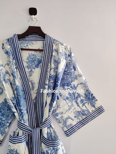 This kimono is made very neatly, and the matching strap has also been used in almost many places in the kimono, which makes the kimono very much. giving a beautiful look It looks good in the photo, but it looks great after wearing this kimono 100% Soft Cotton Hand Block Print Fabric Robe. The perfect to cover up your dance costume, to use for a dinner party or just slip into in on a beautiful summer morning. This particular beauty has a Japanese feeling to it. Cotton kimono robes are perfect for lounging around the home or spa. Use our Floral Hand block print robe :) Measurements: Size: Short & Free Size/ Plus Size Bust Approx: 120 CM ( 47 inch ) You can choose any length in this listing Length: 80 CM, 100 CM, 120 CM, 140 CM You can choose any color in the this listing * BLUE TIGER  * DARK Night Wear Dress, Bridesmaid Kimono, Kimono Robes, Summer Kimono, Printed Robe, Floral Robes, Cotton Kimono, Short Kimono, Boho Kimono