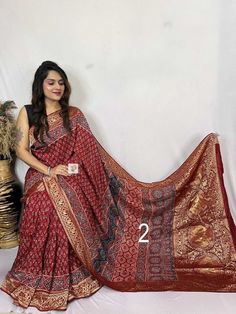 FREE FREE FREE   FREE Petticoat with every Saree and Legging with every Dupatta Order Presenting Pure Dola Silk Ajrakh Saree, Designed Lagdi Patta, Organic Colors, Skin Friendly, Natural Hand Dyed, Silk Sarees For Women Shipping through DHL, FedEx, UPS , Indian Speed post, USPS, Aramex Measurements : Item : Hand Block Ajrakh On Dola Silk With Designed Lagdi patta and Border Type : Saree/ Sari Fabric: Pure Dola Silk Feel : Soft Size: Total Saree length 6.5 Meter Length 5.5 Meter Running Blouse Pi All Types Of Silk Saree, Dola Silk Saree Blouse Design, Ajrakh Sarees, Dola Silk Saree, Ebru Art, Latest Silk Sarees, New Saree Designs, Latest Saree, Antique Necklaces