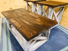 two wooden tables sitting on top of a blue rug