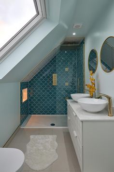 a bathroom with two sinks and a skylight in the ceiling, along with a large white rug on the floor