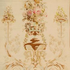 an ornate wall hanging with flowers on it