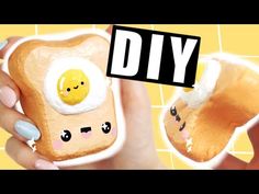 someone is holding two slices of toast with an egg in it and the words diy are