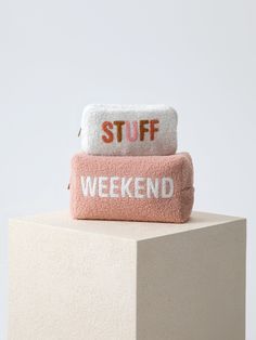 Carry all your odds and ends in style with Shiraleah's "Weekend" Sherpa Zip Pouch! This compact cosmetic case is the perfect size to store makeup, jewelry, and anything else you might need for your weekend plans. Made from trendy blush sherpa fabric, this adorable zip pouch announces its purpose with chic white lettering. Pair with the matching "Weekend" Sweatshirt or other items from Shiraleah's Gameday Collection to complete your look! Shiraleah is a trend-driven lifestyle brand focused on the little gifts that make life special! Features a top zip closure Made from polyester Measures L 9.5" x W 4" x H 6" Made in China Vegan Weekend Sweatshirt, Spa Wraps, Us Labor Day, Sherpa Fabric, Miscellaneous Items, Accessories Display, Odds And Ends, Weekend Plans, Framed Gifts