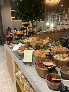 an assortment of food is on display at a buffet