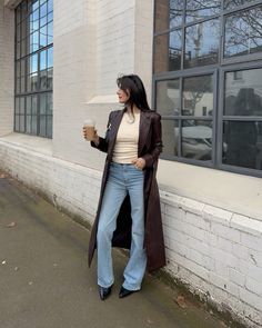 Chocolate brown trench coat outfit, denim outfit, blue jeans outfit, cowboy boots, fall outfit idea, winter outfit idea, aesthetic outfits Long Brown Leather Jacket Outfit, Cowboy Boots Fall Outfit, Brown Boots Outfit Winter, Pointed Boots Outfit, Cowboy Boots And Jeans Outfit, Denim Trench Coat Outfit, Cowboy Boots Outfit Winter, Outfit Blue Jeans