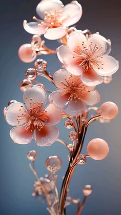 some pink flowers are in a vase with water droplets on it's stems and the petals appear to be floating