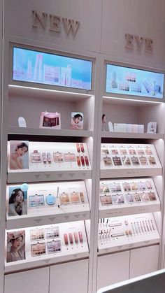 the display case is full of cosmetics and beauty products, including eye shadow palettes