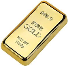 a gold bar with the words fine gold written in black and white letters on it