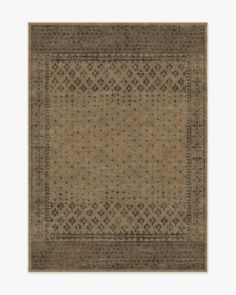 an area rug with brown and black designs on the bottom, in front of a white background