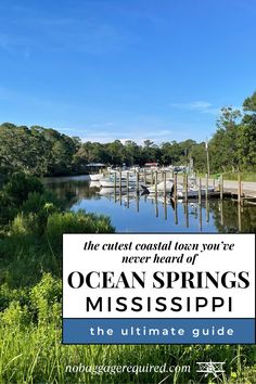 the ocean springs, mississipi guide with text overlaying it and an image of boats docked in the water