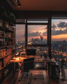 an office with a view of the city at sunset or dawn from it's window