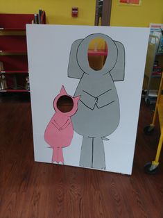 a cardboard box with a drawing of an elephant and a pig on it