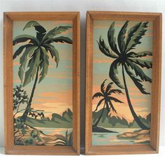 two framed paintings with palm trees on them