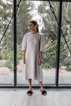 Linen dress BREE Classic neckline , flattering line , relaxed fit, A line  3/4 sleeves  no pockets. Dress length 43,7'' /111 cm  ( from the back to the bottom of the dress ) Relaxed fit, not too loose or oversized. We recommend to order the size you wear for the look like on the model, or go size up or down for more oversized or fitted look.  Please be sure to check the measurements carefully if you decide to go size down or up Model is 175 cm 5'9'' tall, 60kg / 132 lb and wear size M, light grey DESCRIPTION: - Made from Oeko-Tex certified 100% stone washed French linen . - Washed and soft linen dress, so it will not shrink anymore. - Not ironed ( and no need to iron to have relaxed look ) Please choose the right size and color. *Please note that actual colors may vary due to your computer Linen Tunic Dress, Linen Clothing, Linen Shirt Dress, Dress Linen, Inspirational Design, Linen Tunic, French Linen, Dress Midi, Dress C