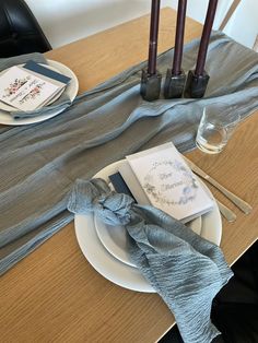 the table is set with napkins and place settings for two people to sit at