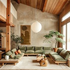 a living room filled with lots of green furniture