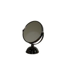 a small round mirror sitting on top of a black stand