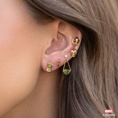 "I am Iron Man." Channel your inner Tony Stark and take your style to new heights with our Marvel's Iron Man Studs. Each stud showcases a fiery red stone encased within sleek metalwork, artfully outlining the iconic helmet of the invincible Avenger. Marvel Earrings, Panther Earrings, Avengers Icon, The Infinity Stones, Eye Of Agamotto, Marvel Jewelry, Mystic Arts, The Infinity Gauntlet, Infinity Stones