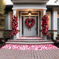 a heart - shaped wreath is on the front door of a house decorated for valentine's day