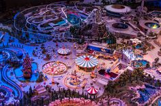 an aerial view of a fairground at night