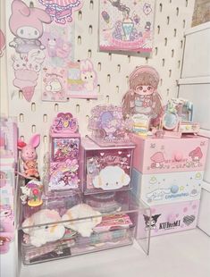 there are many items on display in the store, including dolls and other things for sale