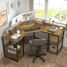 an office desk with several pictures on the wall