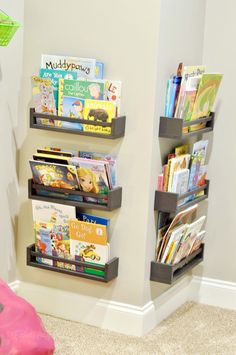 a child's room with toys and books on the shelves