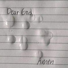 a piece of paper with writing on it that says dear god and an image of water drops