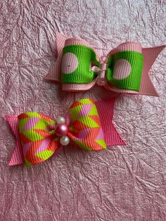 Two cute dog bows one with light pink and green polka dots and one with a geometric pink print Girl Dog Accessories, Bows Hair, Girl Dog