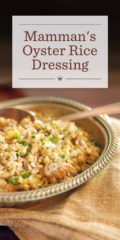 a close up of a plate of food on a wooden table with text overlay that reads, mamman's oyster rice dressing