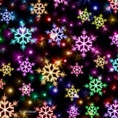 many different colored snowflakes on a black background