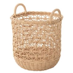 a wicker basket with handles on a white background