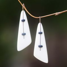 Inspired by the beautiful white sand beaches in Fiji's Yasawa islands these earrings convey tropical sensations. Warren and Robbin combine hand-carved bone with sterling silver adding minimalist details in smooth black rubber. Because each pair is individually handcrafted from natural materials slight variations are to be expected. .925 Sterling silver Production Jewelry, White Sand Beaches, Cow Bones, Brass Hoop Earrings, Beach Earrings, Elegant Pendant, Bone Carving, Earring Crafts, Sterling Silver Hoop Earrings