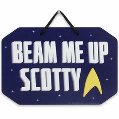 a sign that says beam me up scotty with a star trek symbol on it