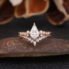 an engagement ring set with a pear shaped diamond