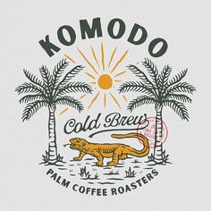 the komodo coffee roast logo with palm trees and a tiger on it's side